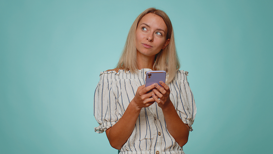 Young Woman Using Smartphone to search 