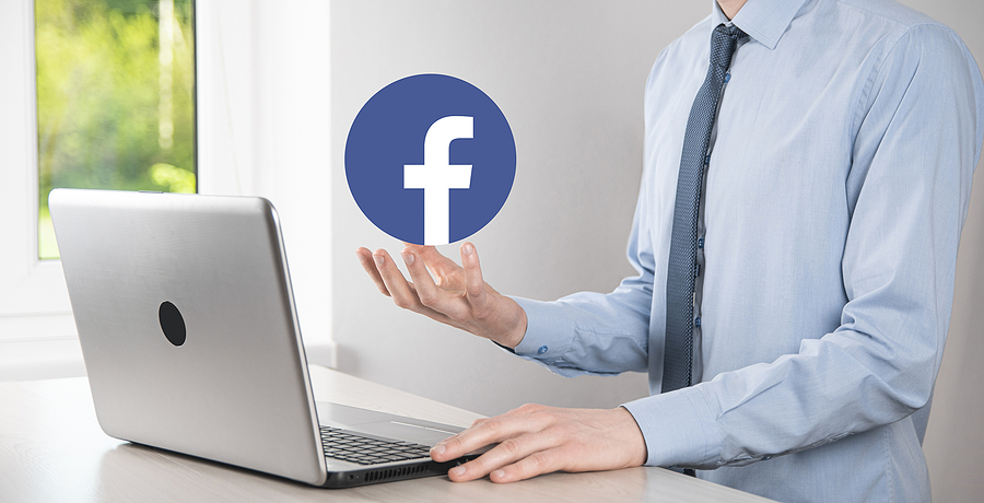 business man with facebook logo
